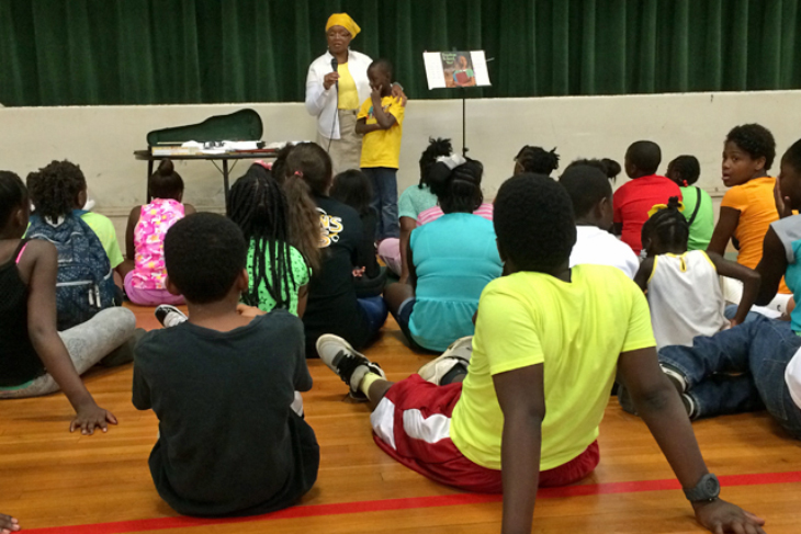 Lynn Gilmore reads to Freedom School students in McComb.