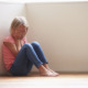 child abuse, child welfare, foster care:Unhappy Child Sitting On Floor In Corner At Home