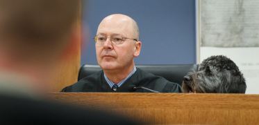 Judge Doug Johnson and Finnegan, the Court Dog