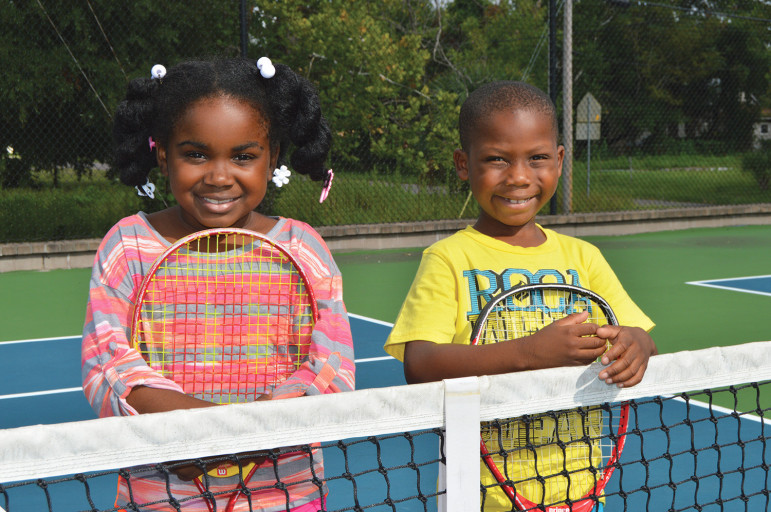 Jayda and Brandon are excited for an afternoon of tennis instruction at the Jacksonville, Fla., Tennis-n-Tutoring after-school program.