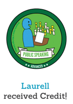 Laurell's badge for public speaking.