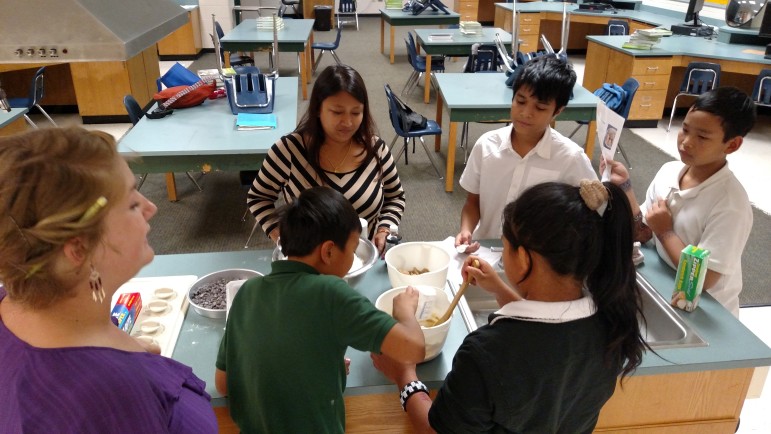 New American Pathway's Bright Futures after-school program is located in two elementary schools and a middle school in DeKalb County, Georgia. Here, students prepare snacks as part of a nutrition lesson. 