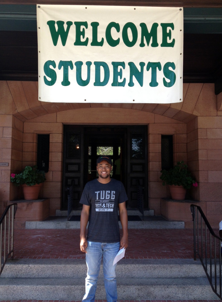 A graduate of the YouthHarbors program moves into his college dorm with the support of, and assistance from, YouthHarbors staff.