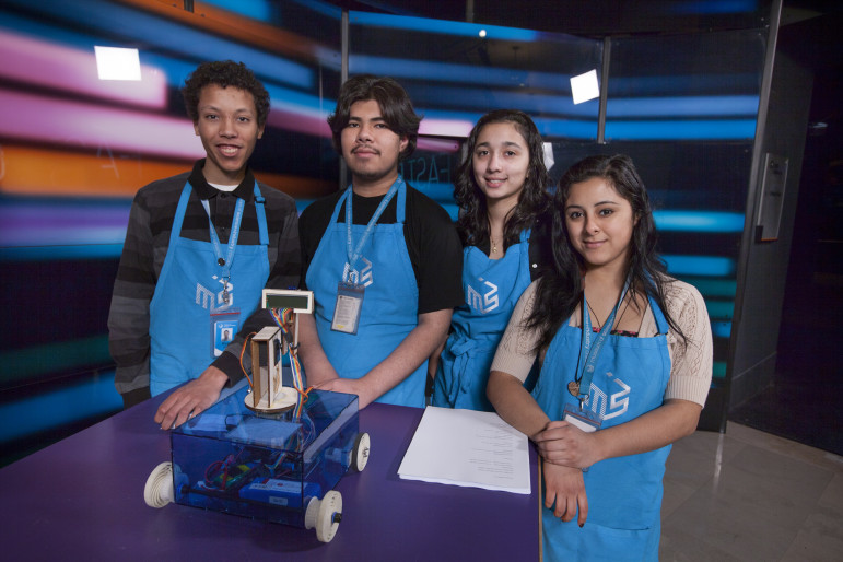 High school students learn about science and then present hands-on experiments to visitors as part of the Science Achievers youth development program at the Museum of Science and Industry, Chicago.