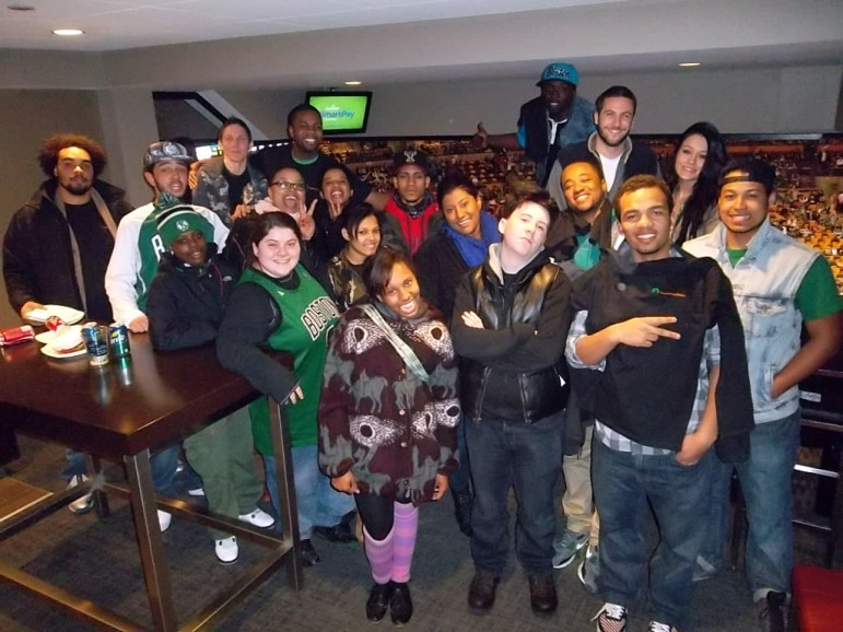 Students from YouthHarbors and other youth served by parent agency JRI, enjoy a Boston Celtics game.