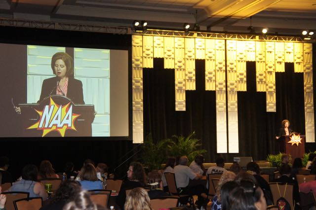 The empowerment of youth workers was emphasized at the National AfterSchool Association annual convention last week, underscored by a superhero theme. Here, Gina Warner, president and CEO, addresses the convention.