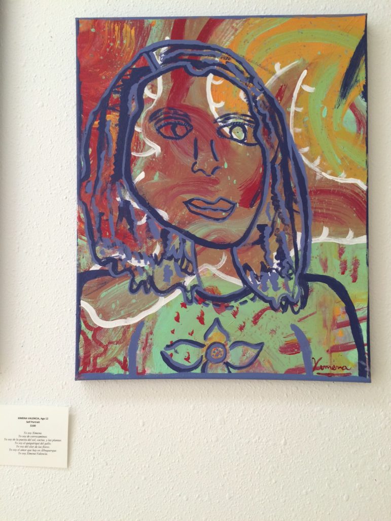 A student's self-portrait displayed at Working Classroom.