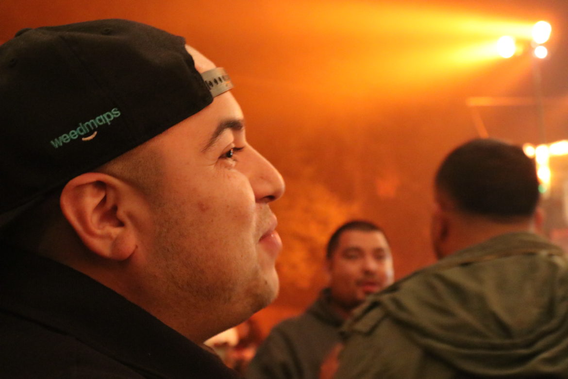 IOW member Jesse Molina smiles as he watches other members have fun. 