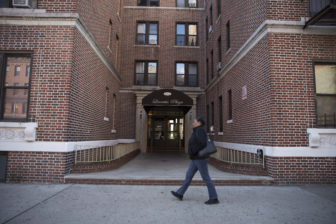 Oct. 14, 2016 - Bay Ridge, Brooklyn - A woman walks by the apartment building on 4th Avenue in Bay Ridge, Brooklyn where Jennifer Cohen lived with her mother. The two were evicted a few months before her death