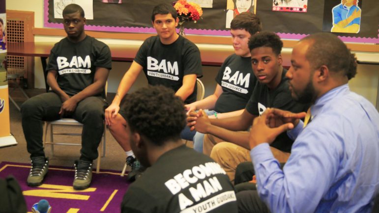Boys at Bowen High School in Chicago take part in a Becoming a Man, a weekly mentoring and counseling circle offered by the nonprofit organization Youth Guidance. Research shows the program significantly reduced violent crime arrests and improved graduation rates.