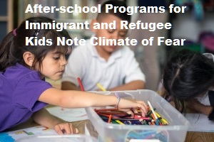 Immigrant children - a young girl and boy - do art in after-school program.