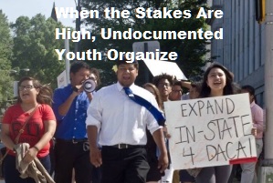 Immigrant young adults march on sidewalk protesting DACA chnages