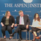 SEL: 3 young women, 1 young man and 1 older man sit in row of chairs on stage with The Aspen Institute written on wall behind them. Young man speaks as other four listen.