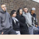 Foster care: Gang Of Youths Leaning On Wall