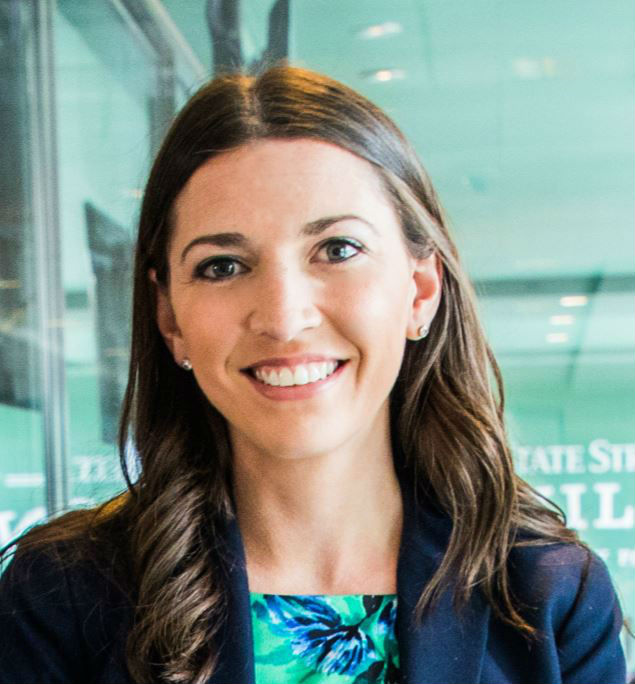 Mentors: Chelsea Aquino (headshot), manager of government relations, public policy for Mass Mentoring Partnership; smiling woman with long brown hair, blue jacket, blue and green top.