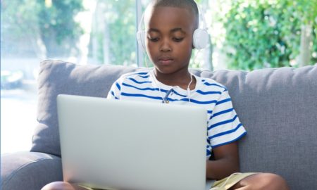 young student on computer at home