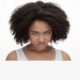 Portrait of angry young African-American teenage girl, Isolated on white background.