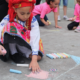 manhattan arts education, children doing art on street