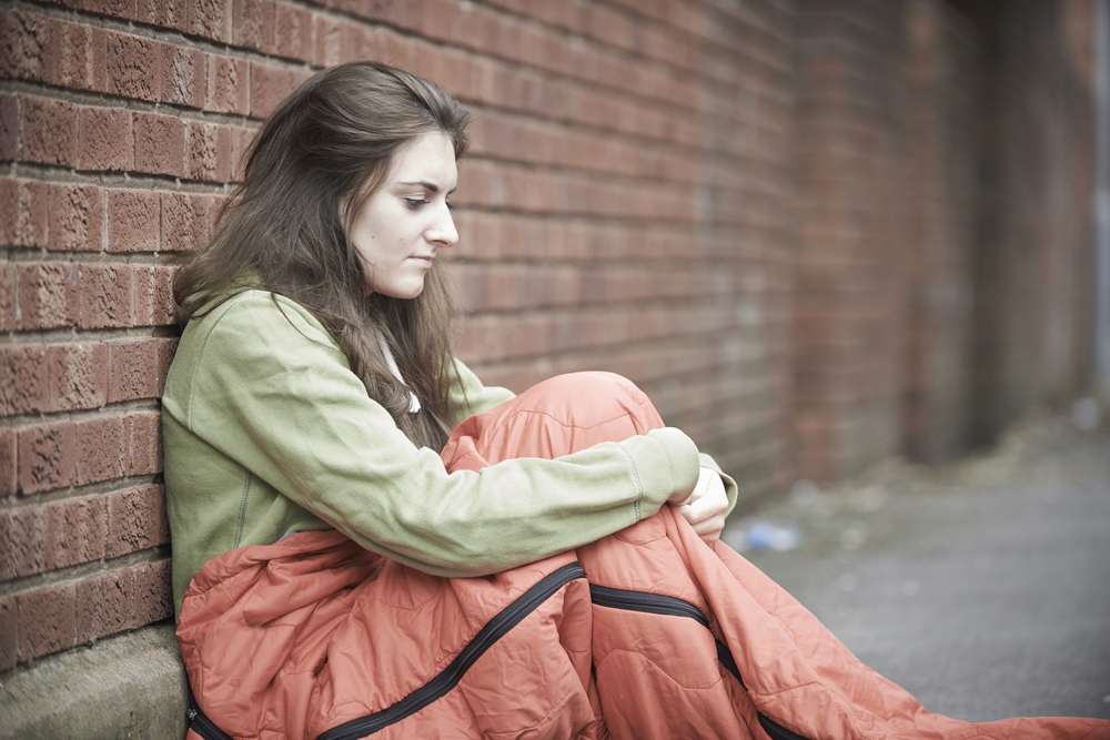 homeless youth: Vulnerable Teenage Girl Sleeping On The Street