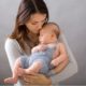 teen parenting and mental health grants; young mother holding baby