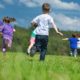 texas youth health grants; children running in field