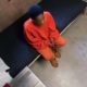 color of youth in adult justice system report; young black teen in jail cell