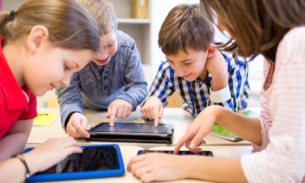 AI in education, education technology; children in school on tablets