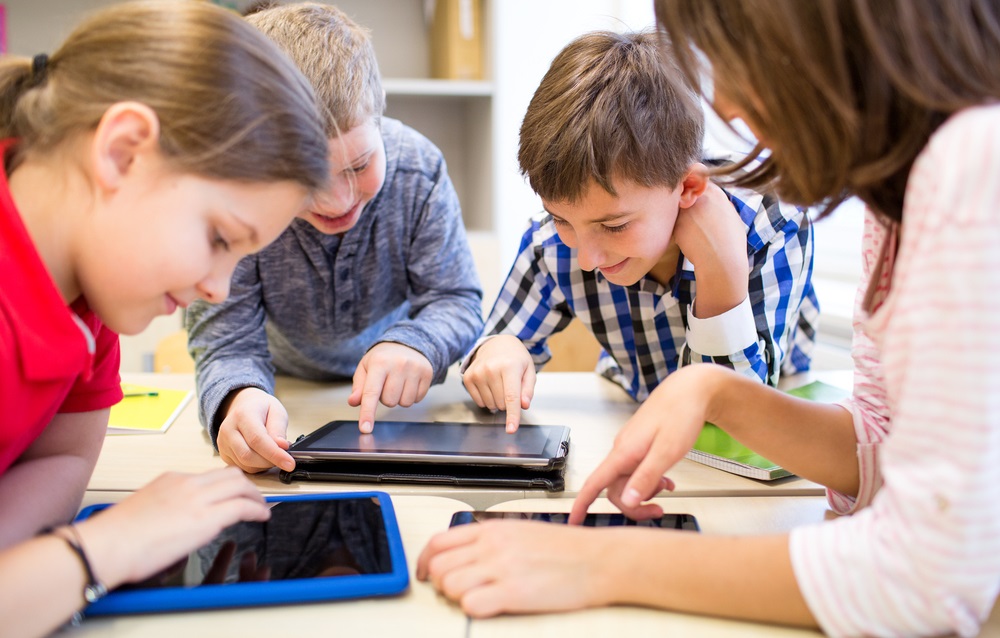AI in education, education technology; children in school on tablets