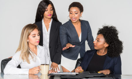 OST: Group of businesswomen working together in an office
