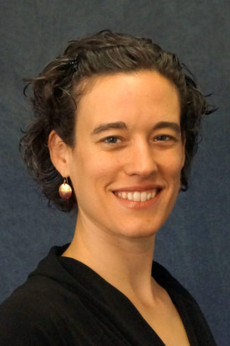 Elizabeth Markle (headshot), chair of Community Mental Health at California Institute of Integral Studies, smiling woman with short, dark hair, earrings, black top