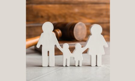 families in justice system support grants; family in front of gavel graphic