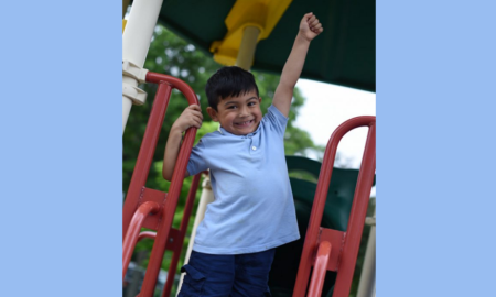 Minnesota early childhood and youth development program grants; happy child on playground