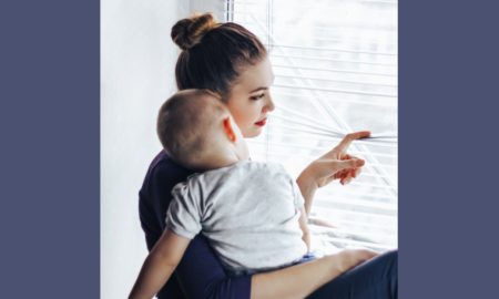 teen/young parent services program grants; young mother with child looking out window