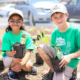 k-12 environmental education garden grants; two children smiling in garden