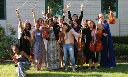 youth music education program grants; happy youth posing with instruments