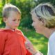 effective discipline to raise healthy children report; parent scolding child