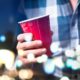 college alcohol abuse reduction grants; student holding red cup