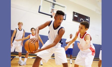 school sports/athletics support grants; students playing basketball in school gym