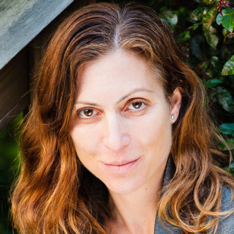Oakland: Lara Bazelon (headshot), author of book Rectify: The Power of Restorative Justice After Wrongful Conviction, woman with shoulder-length red hair, gray jacket