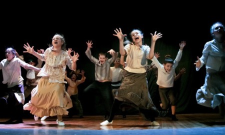 K-12 youth theatre education grants; children perform play on stage