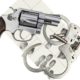 gun violence: Gun with handcuffs and fingerprint ID for criminal arrest.