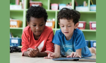 illinois early childhood education, employment and environment grants; two young students reading