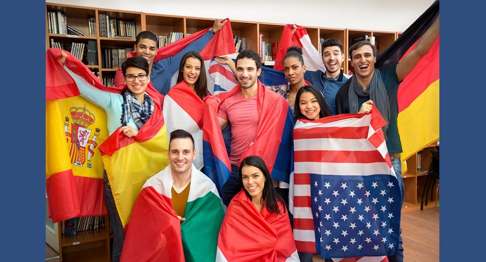 youth exchange, youth leadership exchange grant; youth standing with the flags of their countries