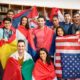youth leadership exchange grant; youth standing with the flags of their countries