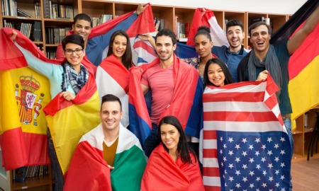 youth exchange, youth leadership exchange grant; youth standing with the flags of their countries