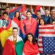youth exchange, youth leadership exchange grant; youth standing with the flags of their countries