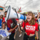 youth activists: Unidentified young woman with megaphone at March for Our Lives gun violence protest organized by youth.