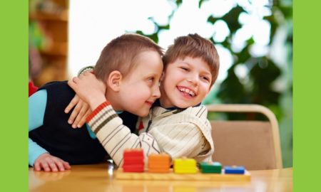 Minnesota disable children life improvement grants; two happy children with disabilities