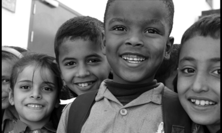 Southeast rural community social change grants; children smiling at camera