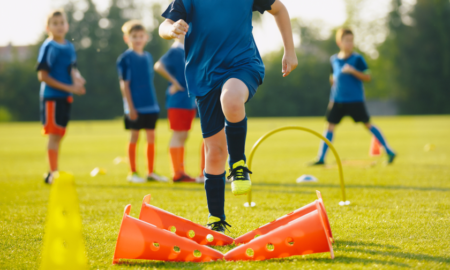 preventing youth sports injuries grants; young children practicing on field